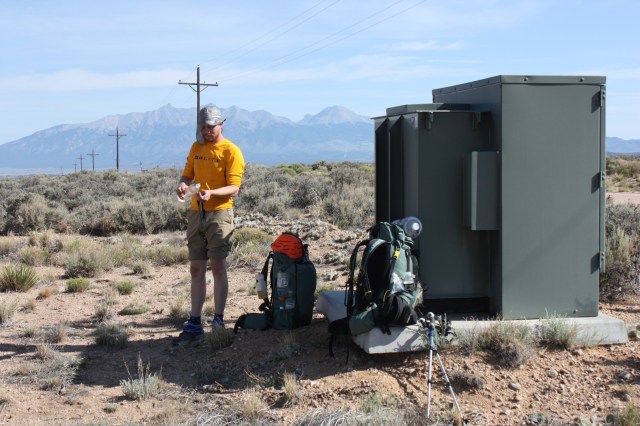 A bit of shade on a shadeless road.