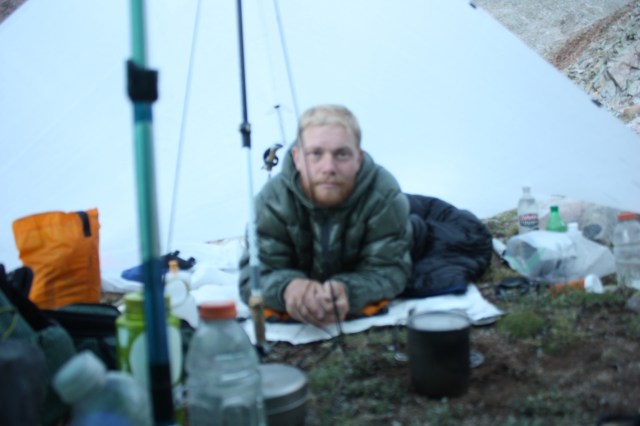 Junaid under his tarp in Navajo Basin.