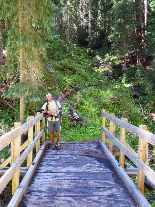 Luke crosses a bridge during the second day of our walk from Quandary thru Copper to Holy Cross.