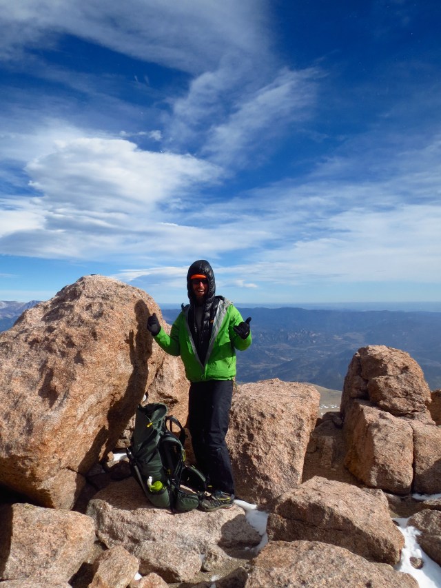 Luke with the Longs Peak summit register.